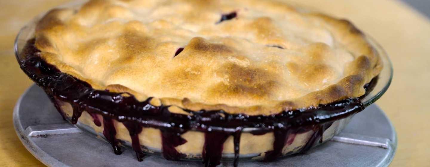 Closeup of a baked blueberry pie