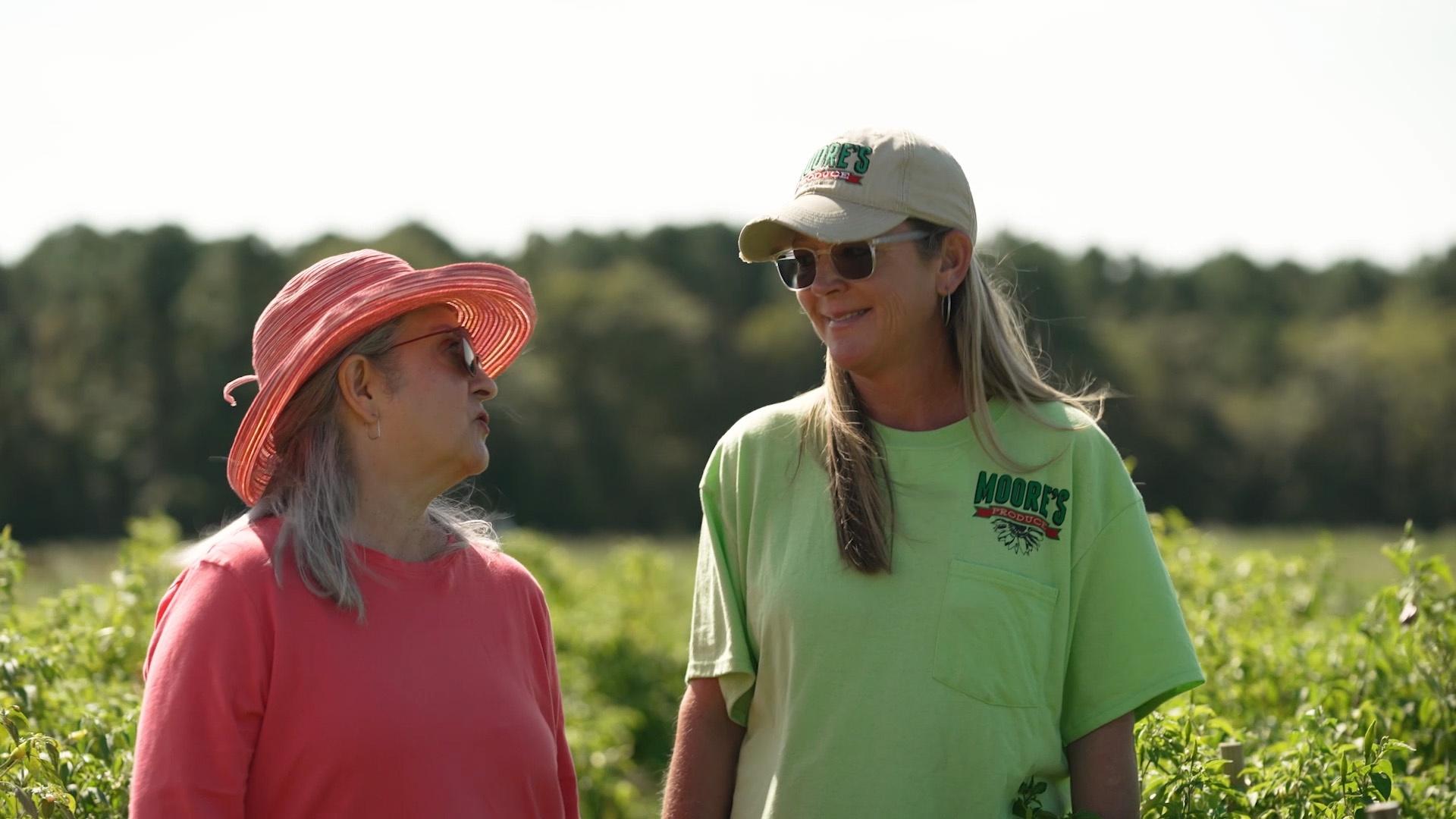 Sheri Castle with Stephanie Moore, owner of Moore's Produce.