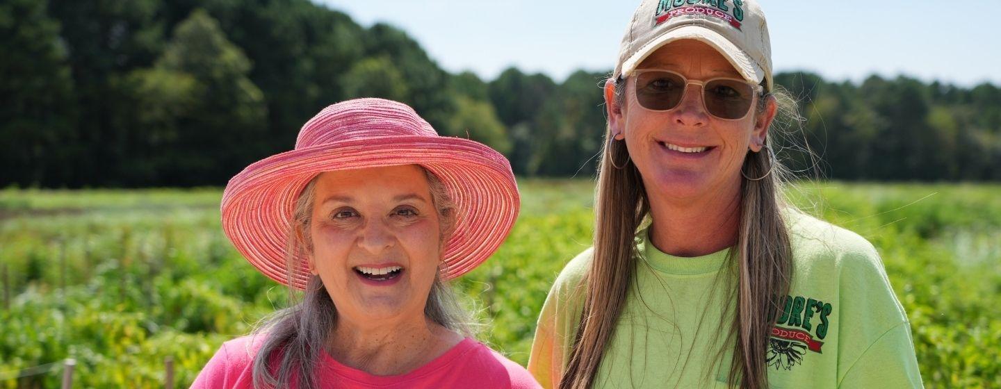 Sheri Castle with Stephanie Moore, owner of Moore's Produce.