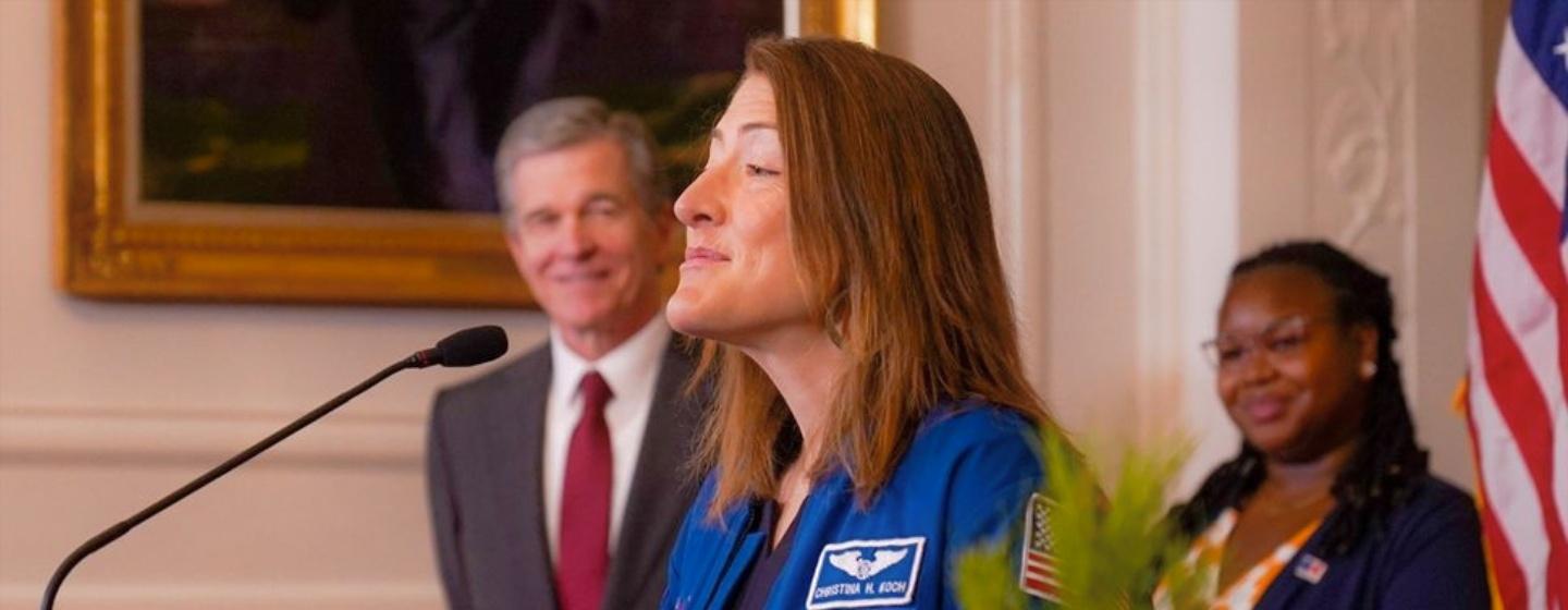 Artemis 2 astronaut Christina Koch is seen the Governor's Mansion in her home state of North Carolina as Governor Roy Cooper looks on, on Wednesday, April 24, 2024.