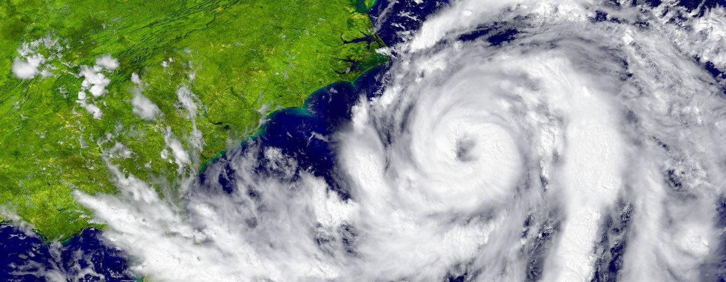 Aerial of a hurricane over the Atlantic Ocean, heading for southern US states.