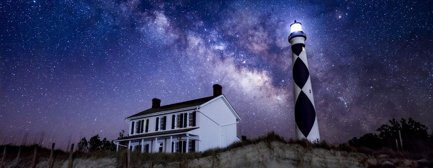 cape lookout lighthouse at night under starry sky dark sky zone