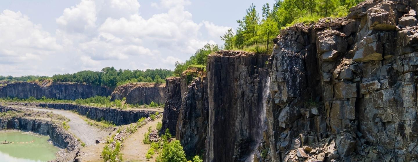 Rock formations with trees growing above them