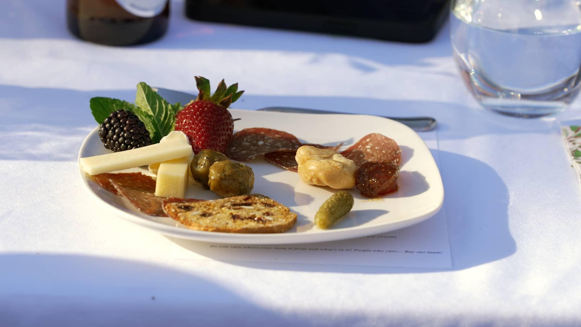 Lamb salami shares the plate with other local products at a farm-to-table dinner.