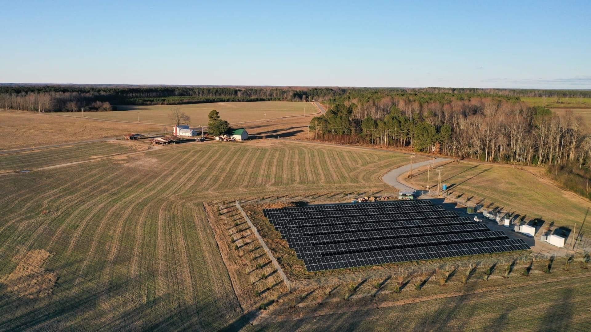 A small installation of solar panels on a farm in eastern North Carolina. It provides income to the farmer through a land-lease agreement and power to the local electric cooperative. It also allows farming to continue on the surrounding land.