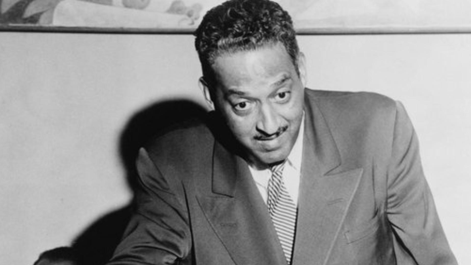 Thurgood Marshall gives a press conference in his role as chief counsel for the NAACP, 1955. Everett Collection Historical/Alamy Stock Photo.