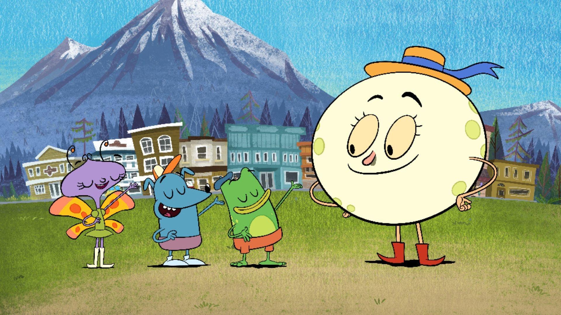 Block Party Star, Let's Go Luna, Leo, Andy and Carmen stand in front of a scenic mountain town.