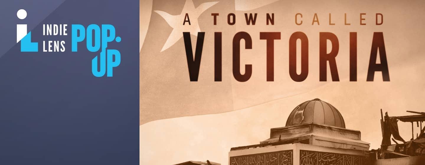 The title, 'A Town Called Victoria' hovers over the mosque in Victoria, TX after it was burned