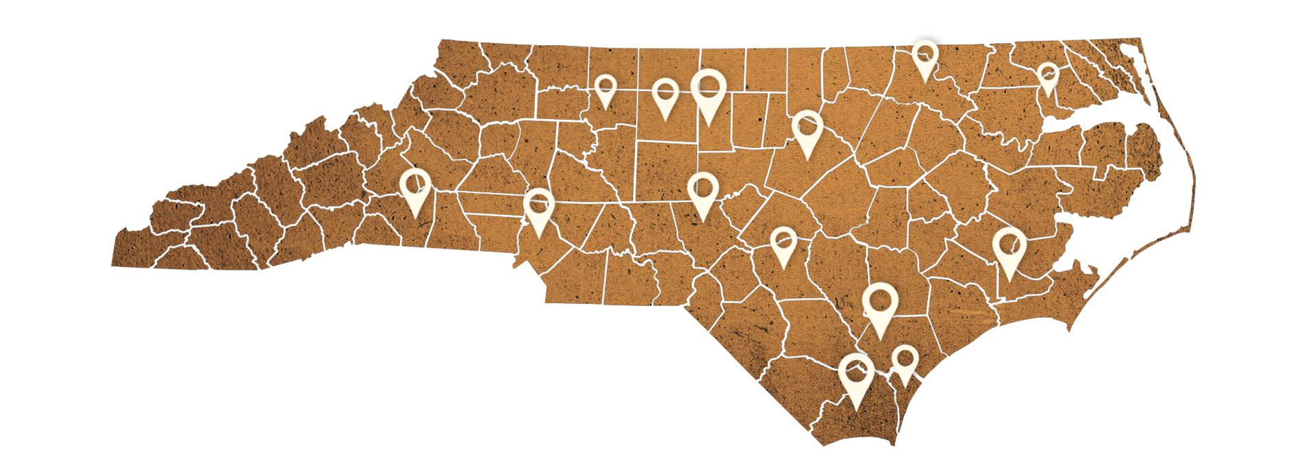 A brown map of North Carolina, sectioned by county with locator pins on Alamance, Brunswick, Chowan, Craven, Cumberland, Forsyth, Guilford, Halifax, Mecklenburg, Moore, New Hanover and Rutherford counties.