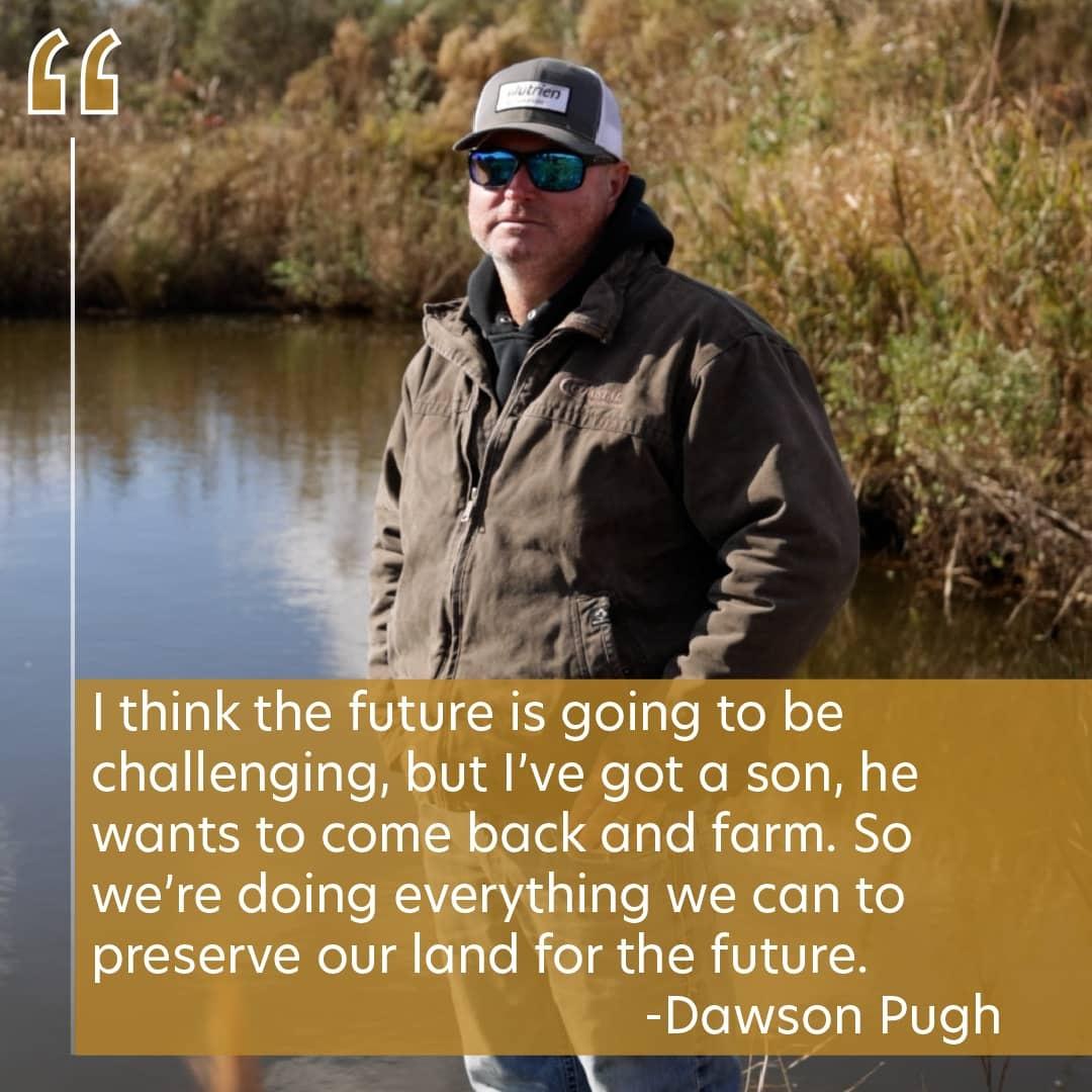 A man stands alongside a pond. The text on the image reads: "I think the future is going to be challenging, but I've got a son, he wants to come back and farm. So we're doing everything we can to preserve our land for the future." -Dawson Pugh