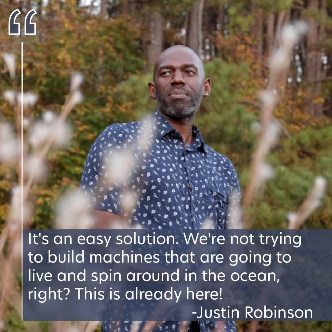 Justin Robinson stands in a grassland area, looking off to the side. The text on the image reads, "It's an easy solution. We're not trying to build machines that are going to live and spin around in the ocean, right? This is already here!"