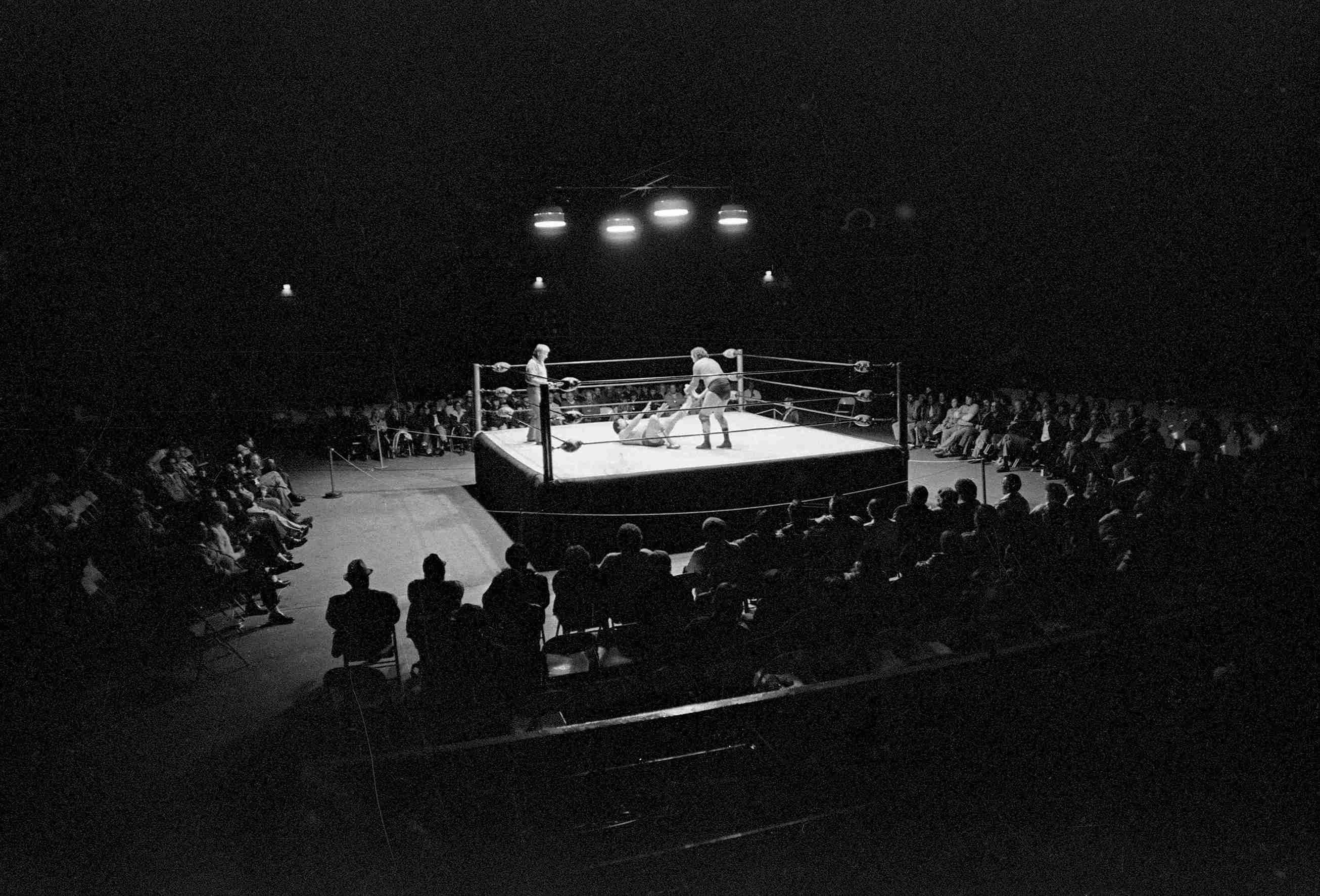 Preliminary wrestlers Kim Duk and Abe Jacobs open a night of wrestling in Dorton Arena. November  12, 1980. Photographer: Harry Lynch.