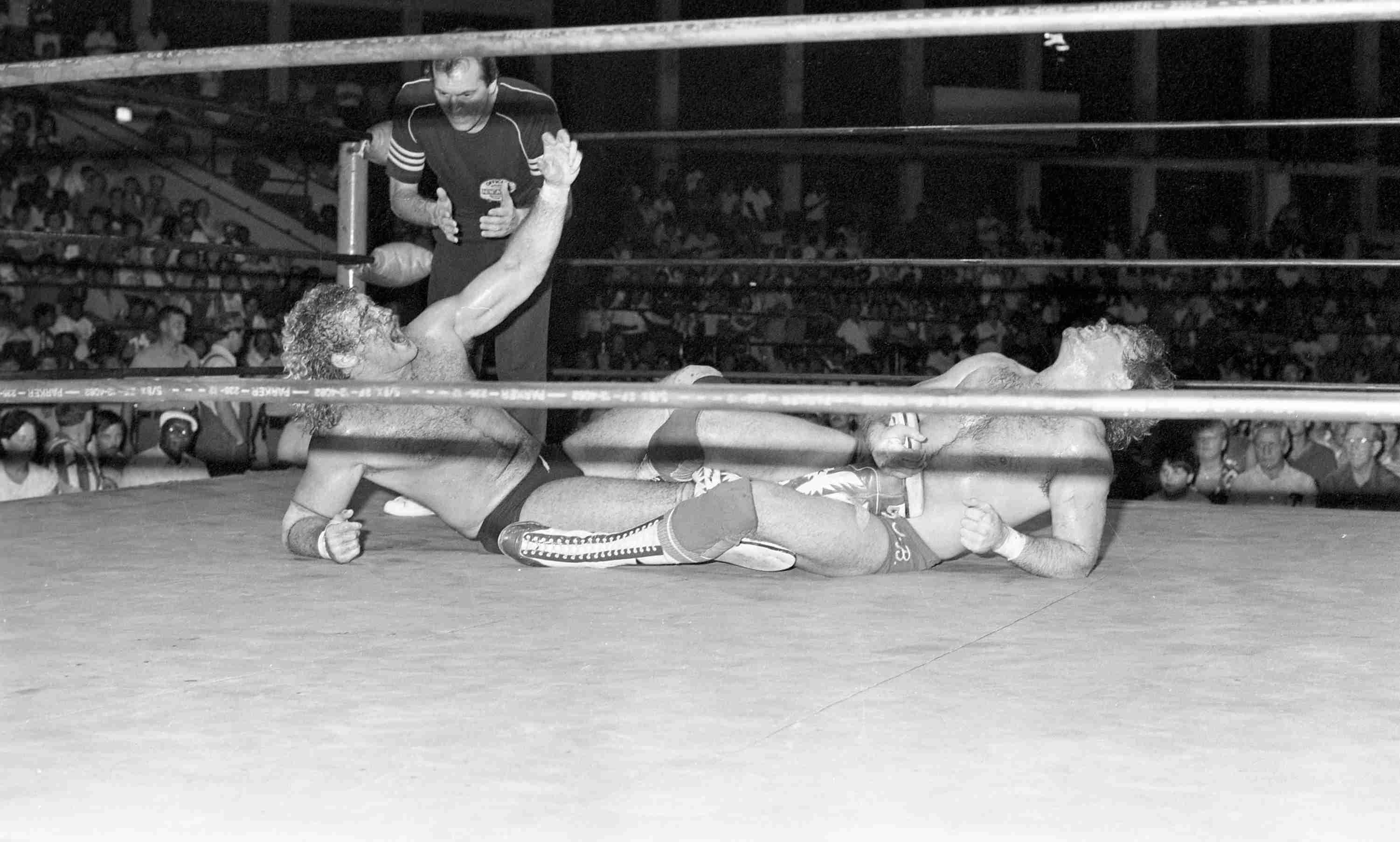 Fan-favorite Magnum T.A. looks to the fans for strength in a United States Title matchup against champion Tully Blanchard in Dorton Arena. August 1, 1985. 