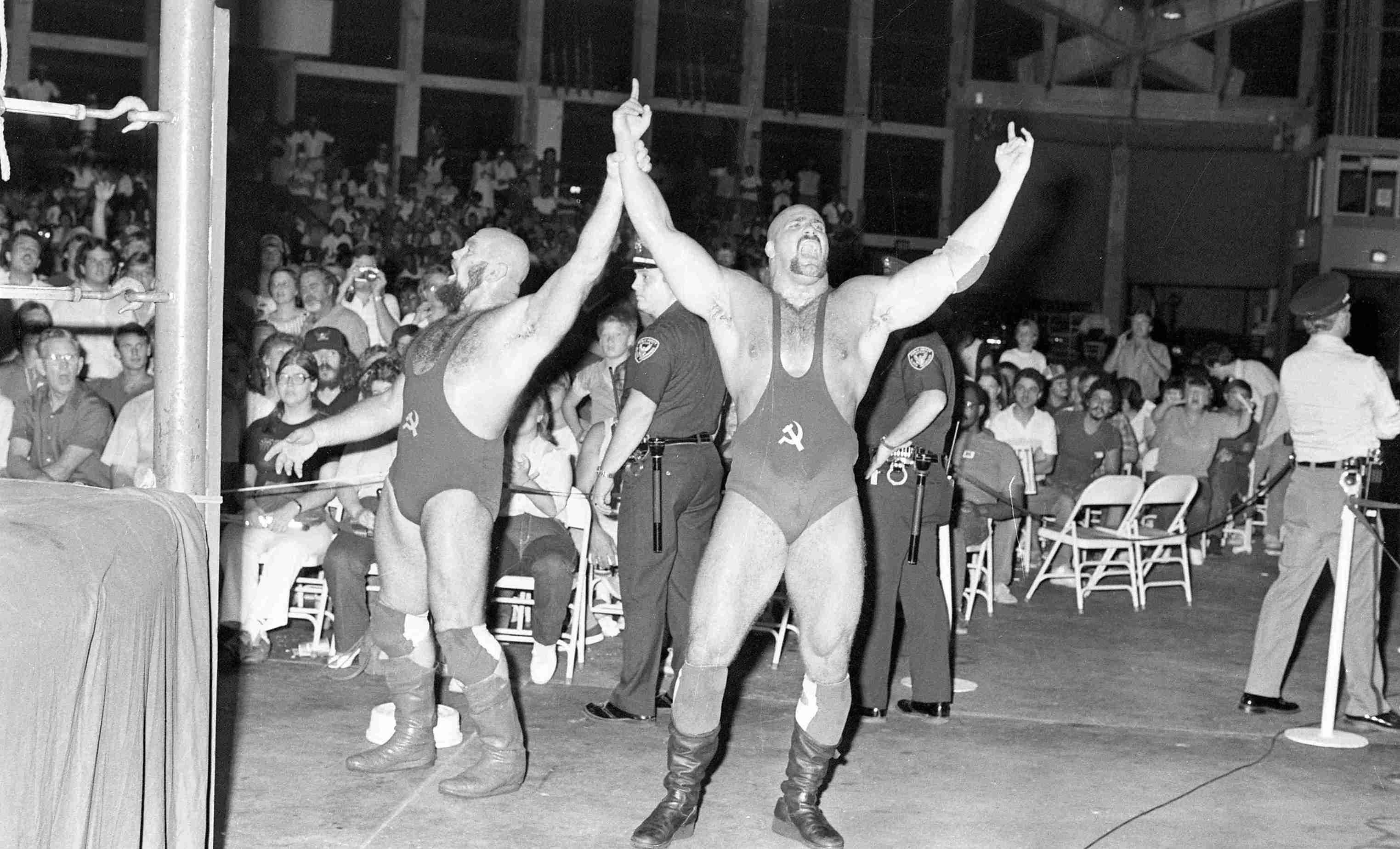 The Russians, Ivan and Nikita Koloff, take in the Southern fans’ jeers in Dorton Arena. August 1, 1985.