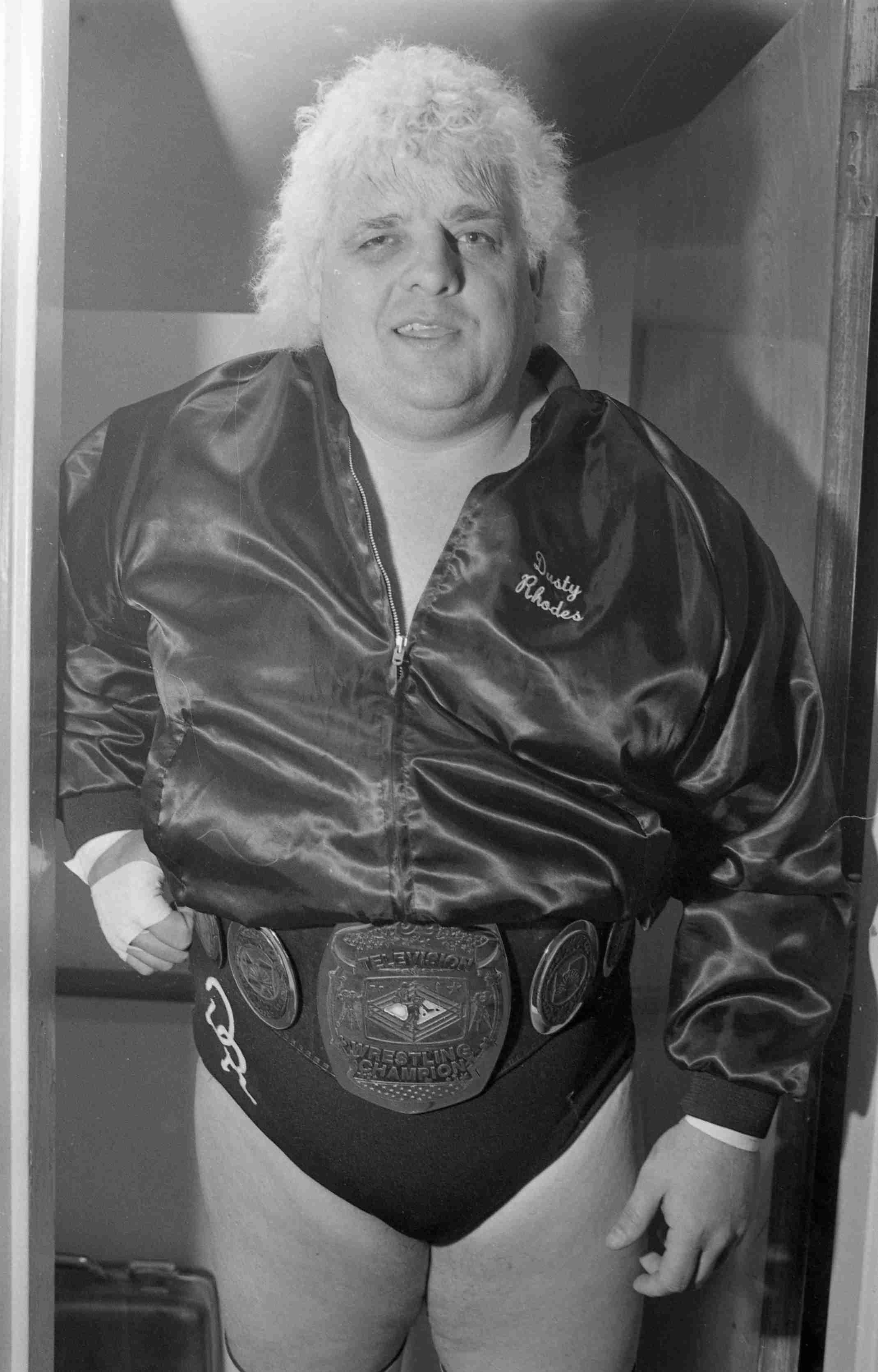 “The American Dream” Dusty Rhodes sporting his Television Wrestling Championship backstage at Dorton Arena. April 3, 1985. 