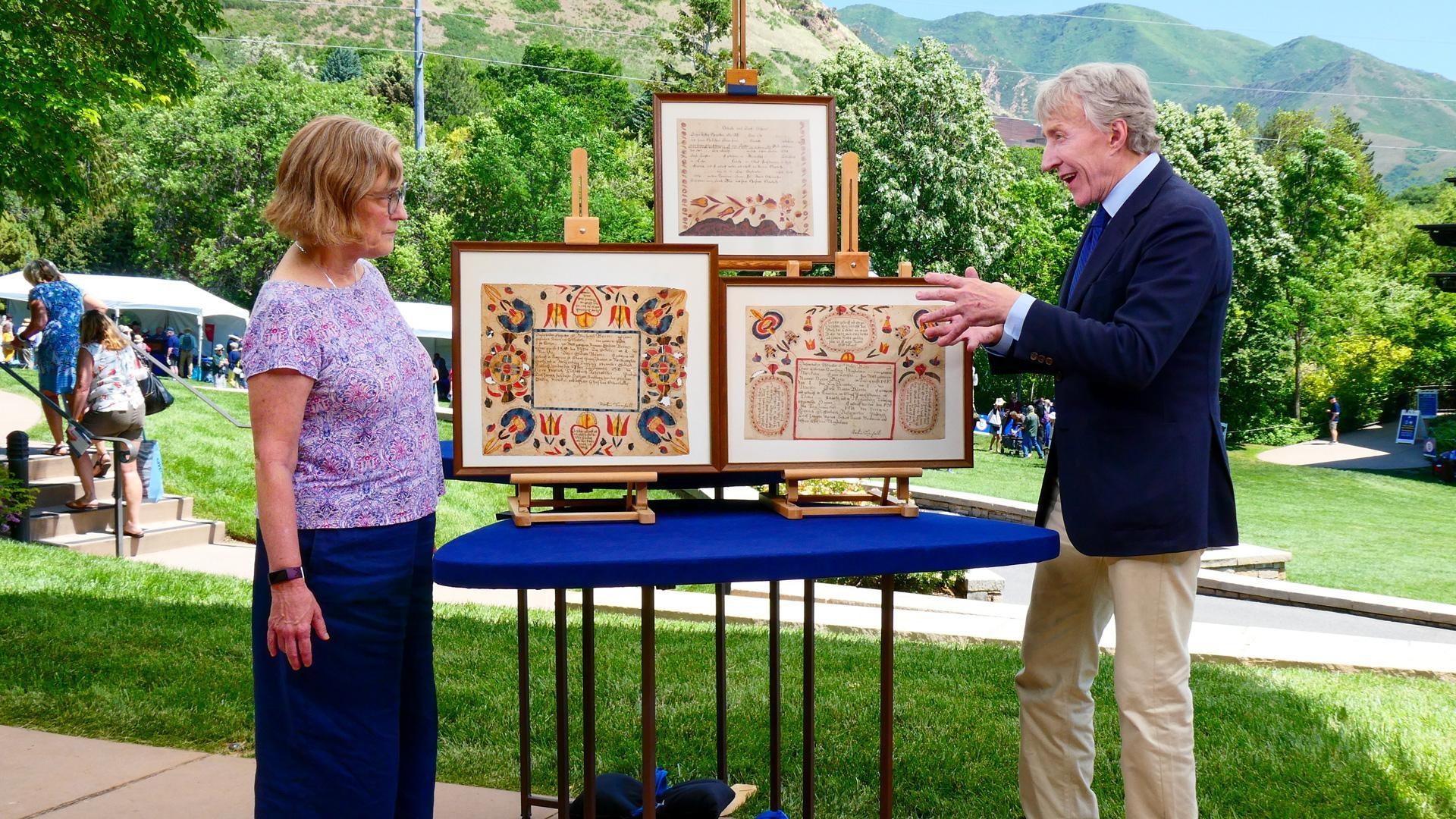 Leigh Keno (right) appraises Pennsylvania German frakturs, ca. 1815, in Salt Lake City, UT. ANTIQUES ROADSHOW “Red Butte Garden & Arboretum, Hour 1” premieres Monday, January 5 at 8/7C PM on PBS. 