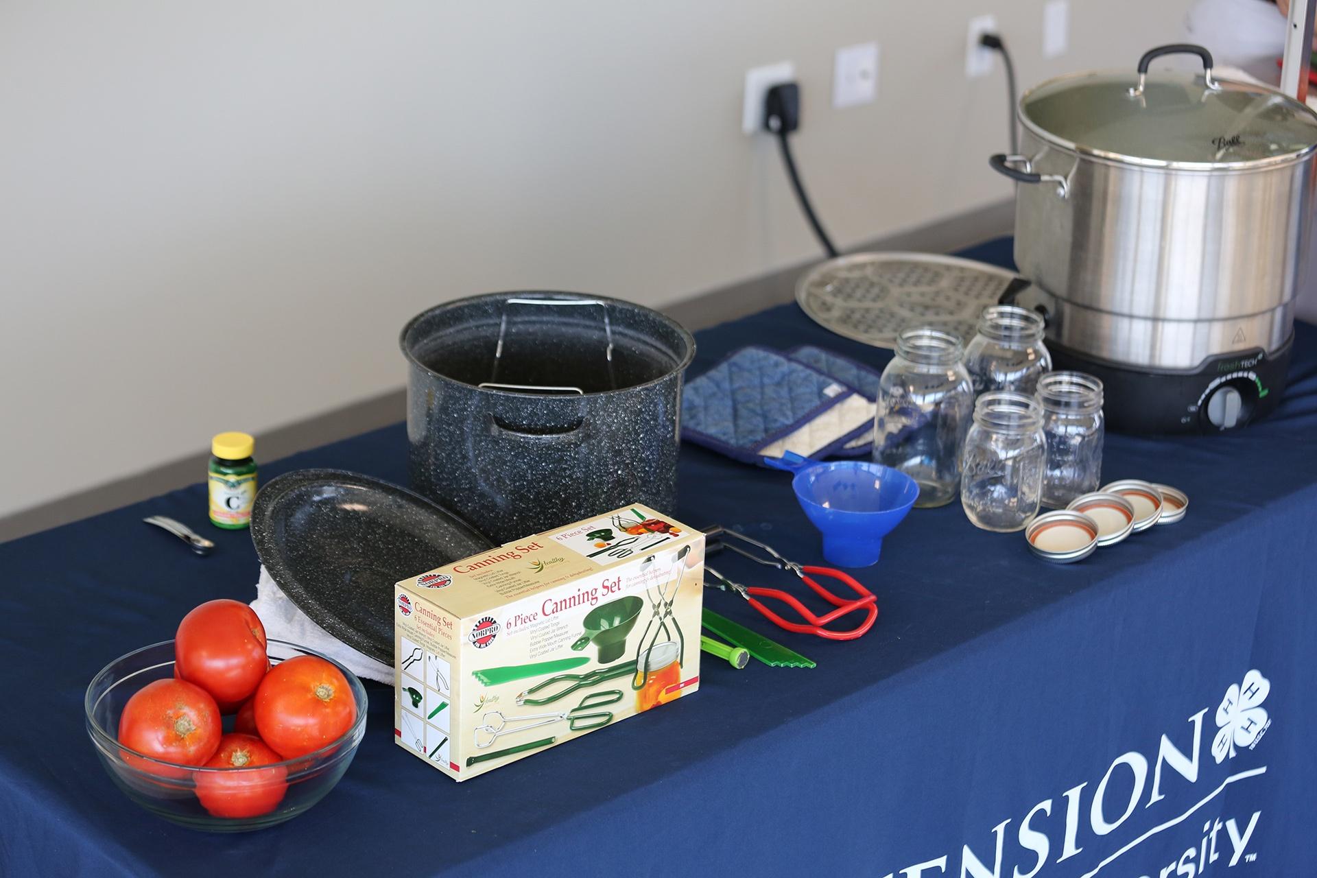 Photo of suggested equipment needed for canning tomatoes.