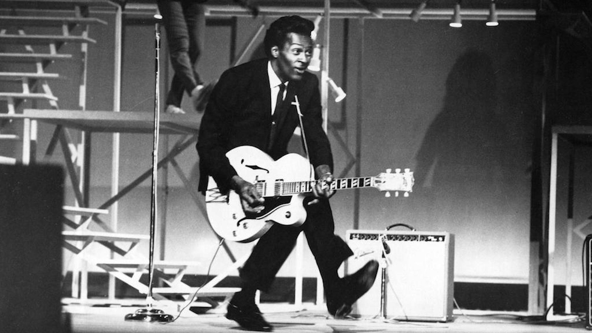 Chuck Berry playing the guitar