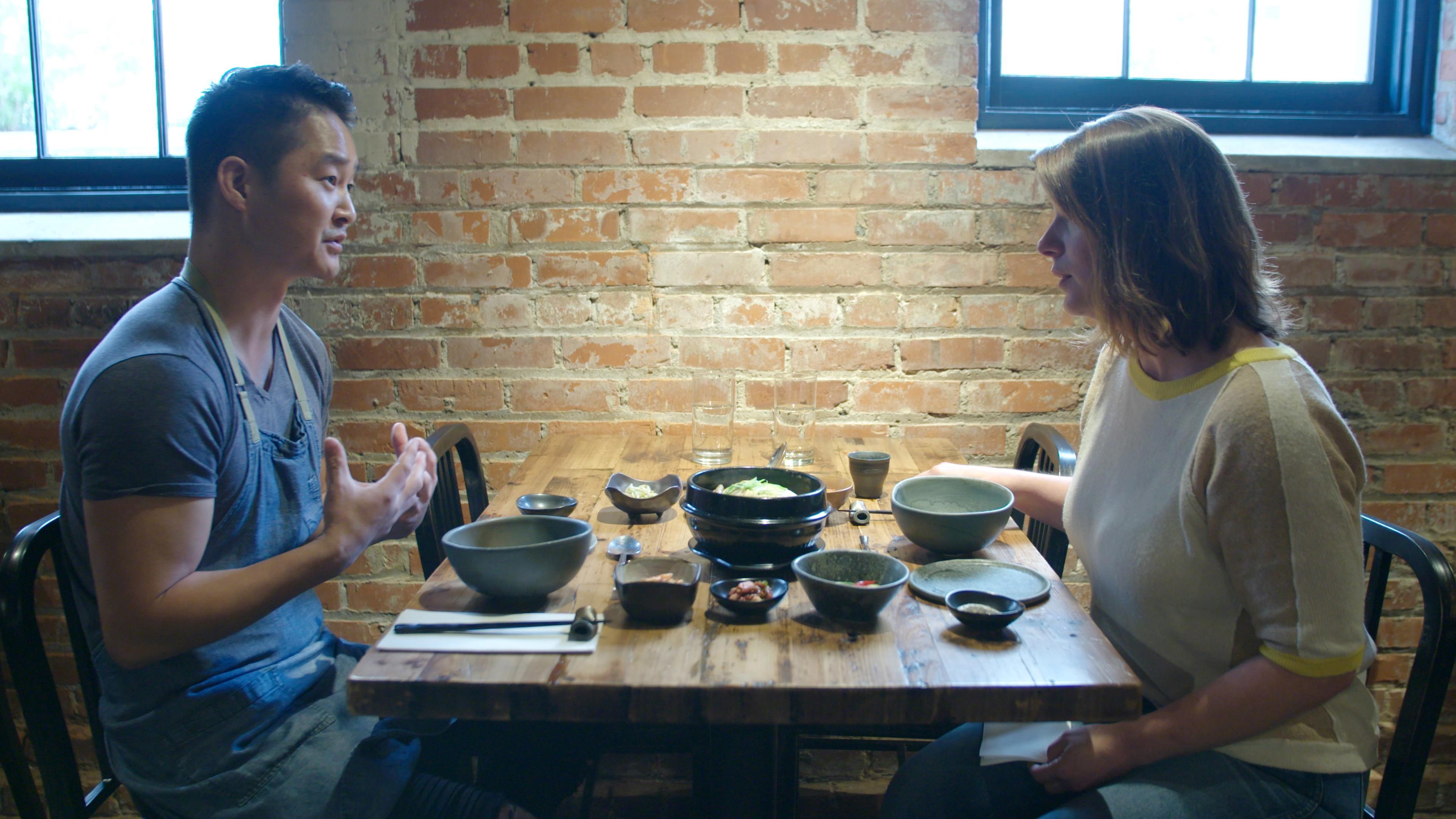 Vivian Howard at a table.
