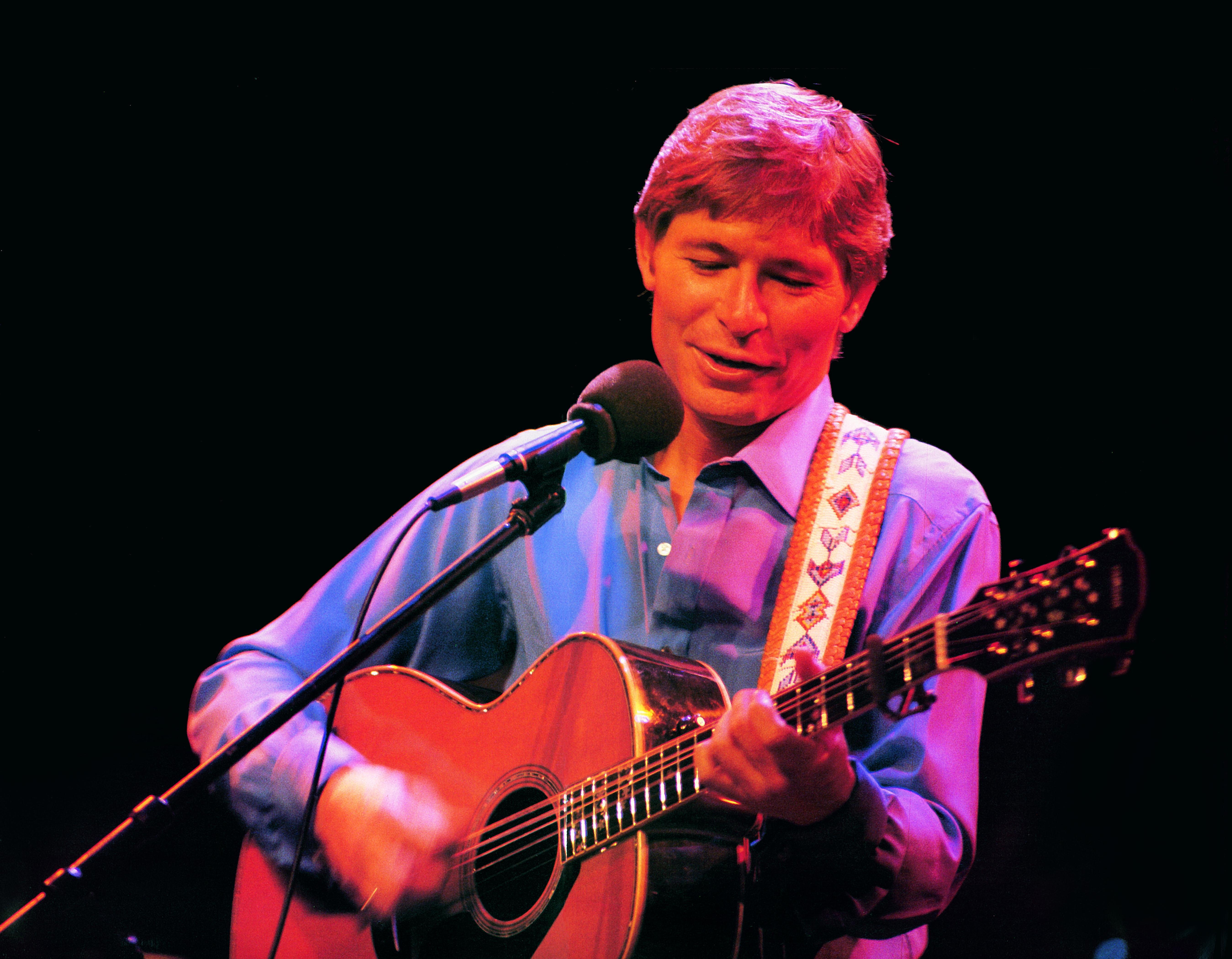 John Denver on stage
