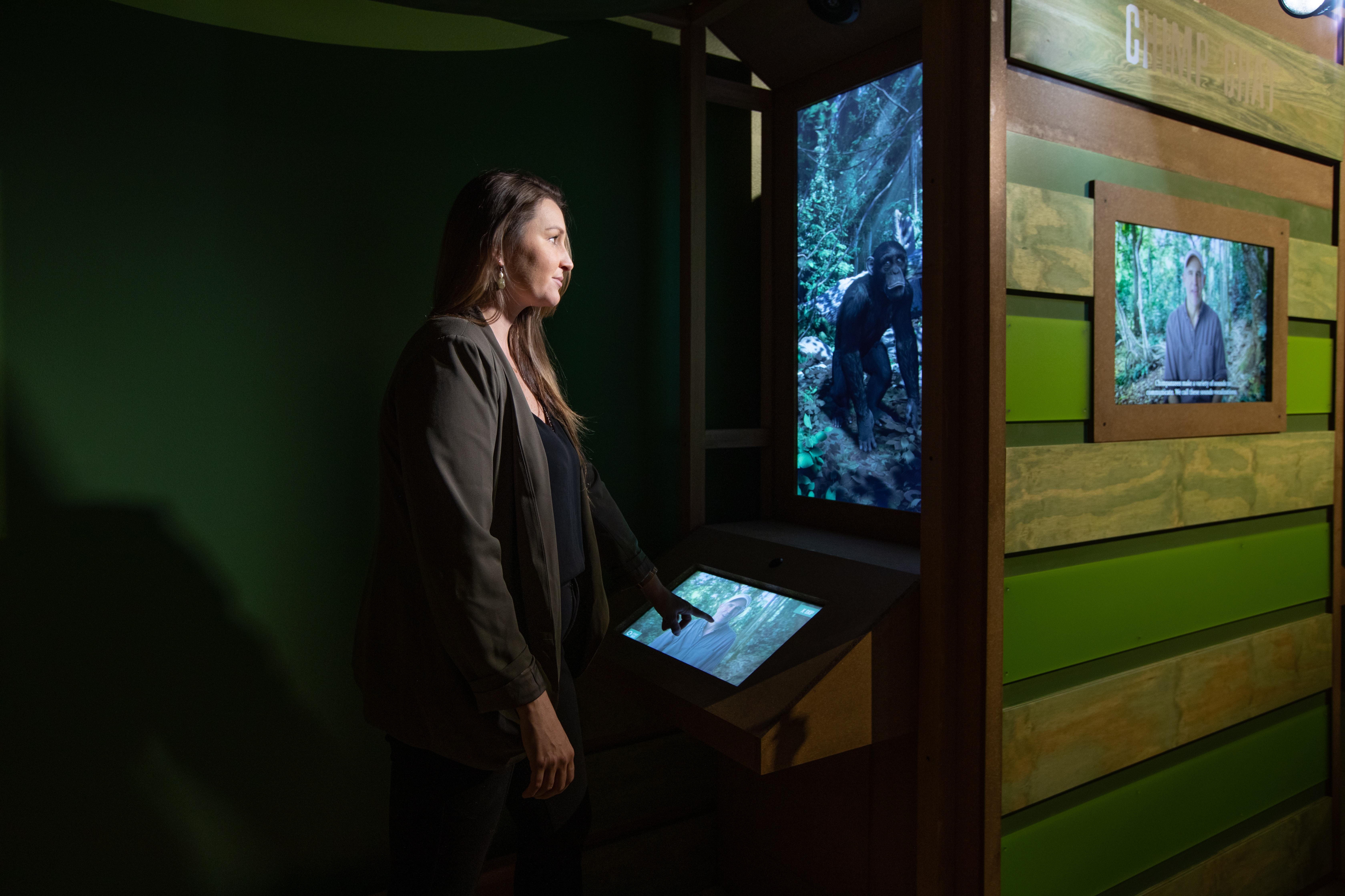 woman at interactive station in the becoming jane exhibit