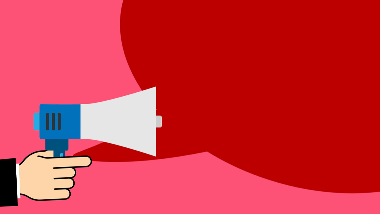 megaphone with red comment bubble