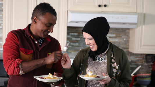 Detroit-based pastry chef Lena Sareini shares a fist bump with Marcus Samuelsson, the host of NO PASSPORT REQUIRED