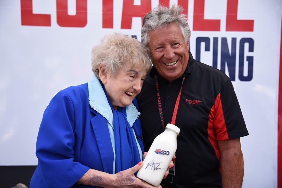 Eva Kor with racing icon Mario Andretti.