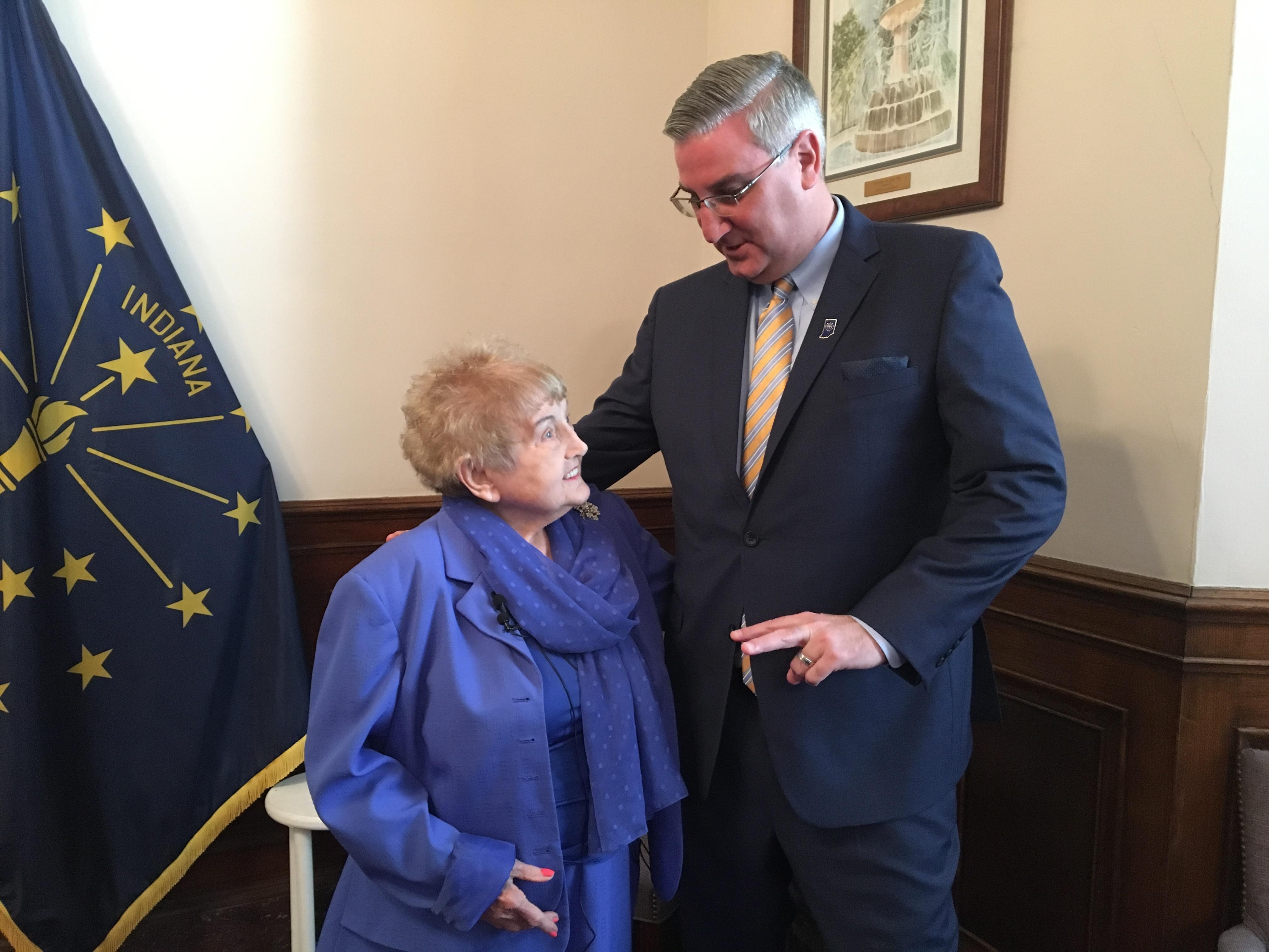 Eva Kor with Indiana Governor Holcomb.