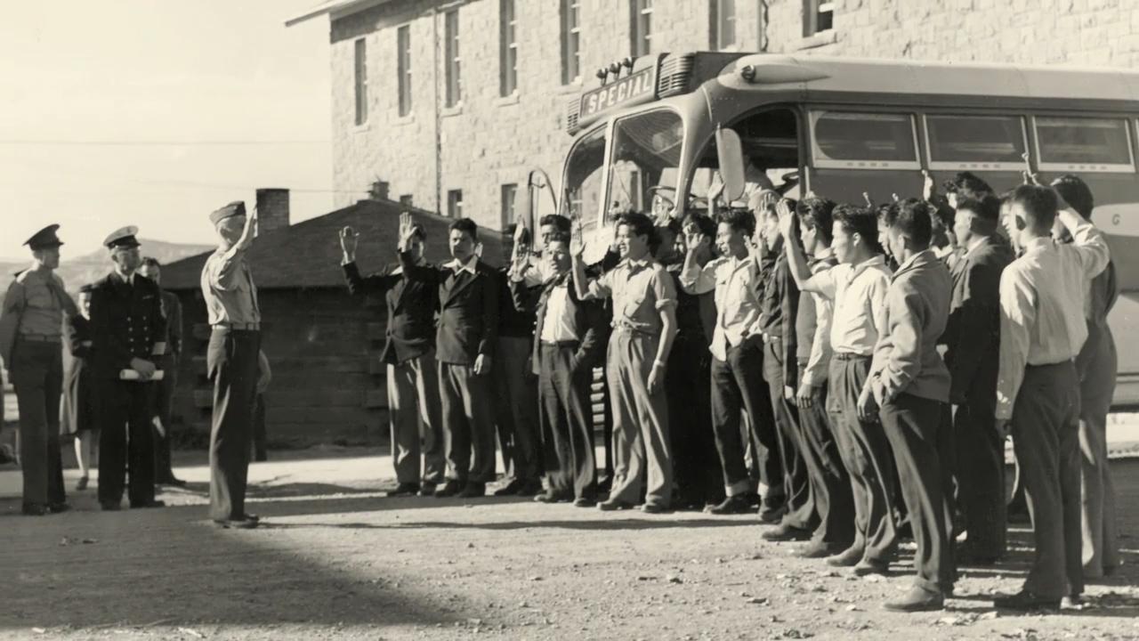 Twenty-nine Navajo recruits, about to be trained as code talkers, arrive at Fort Wingate in April 1942.