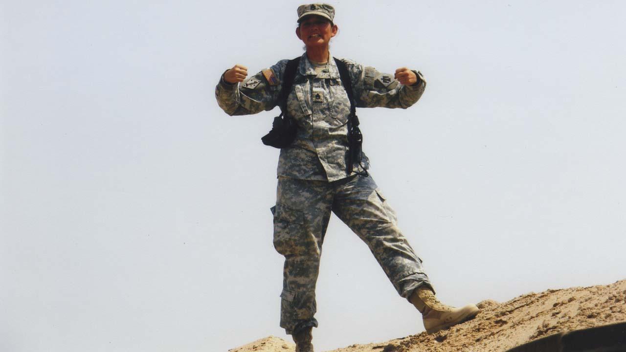 warrior woman in military uniform