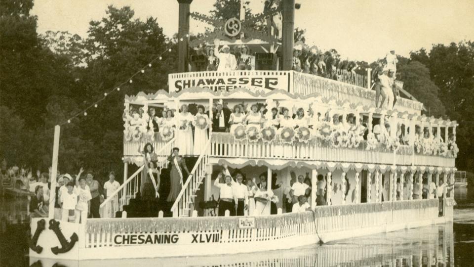 A crowd of people on the Shiawassee Queen riverboat.