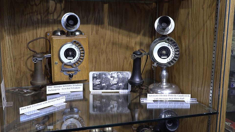 Early telephones on display in the Montrose Telephone Museum.