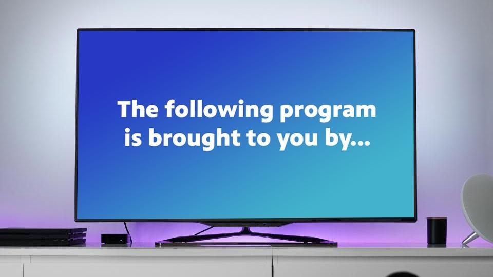 A TV with a graphic on the screen that says, "The following program is brought to you by..."