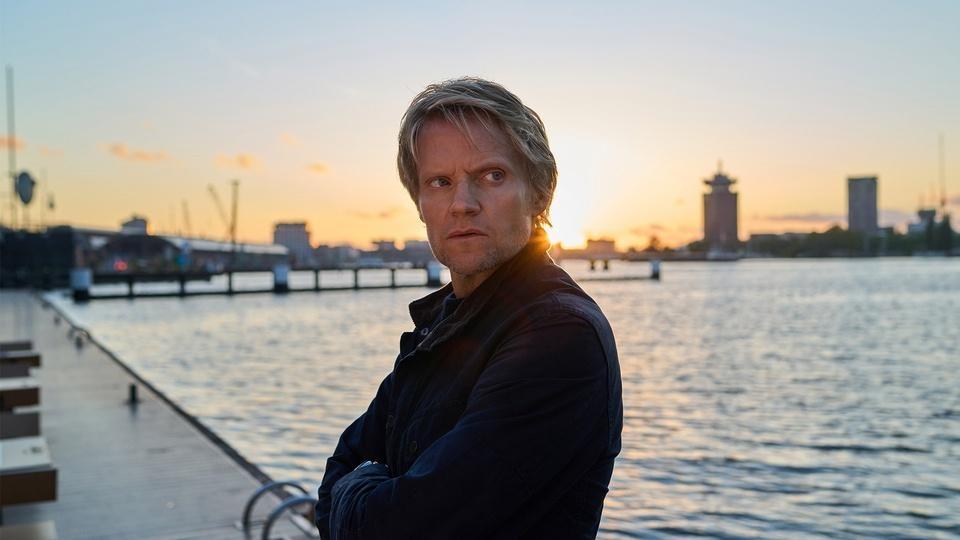 Piet van der Valk at a harbor