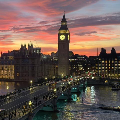 Big Ben and Westminster Bridge at sunset.