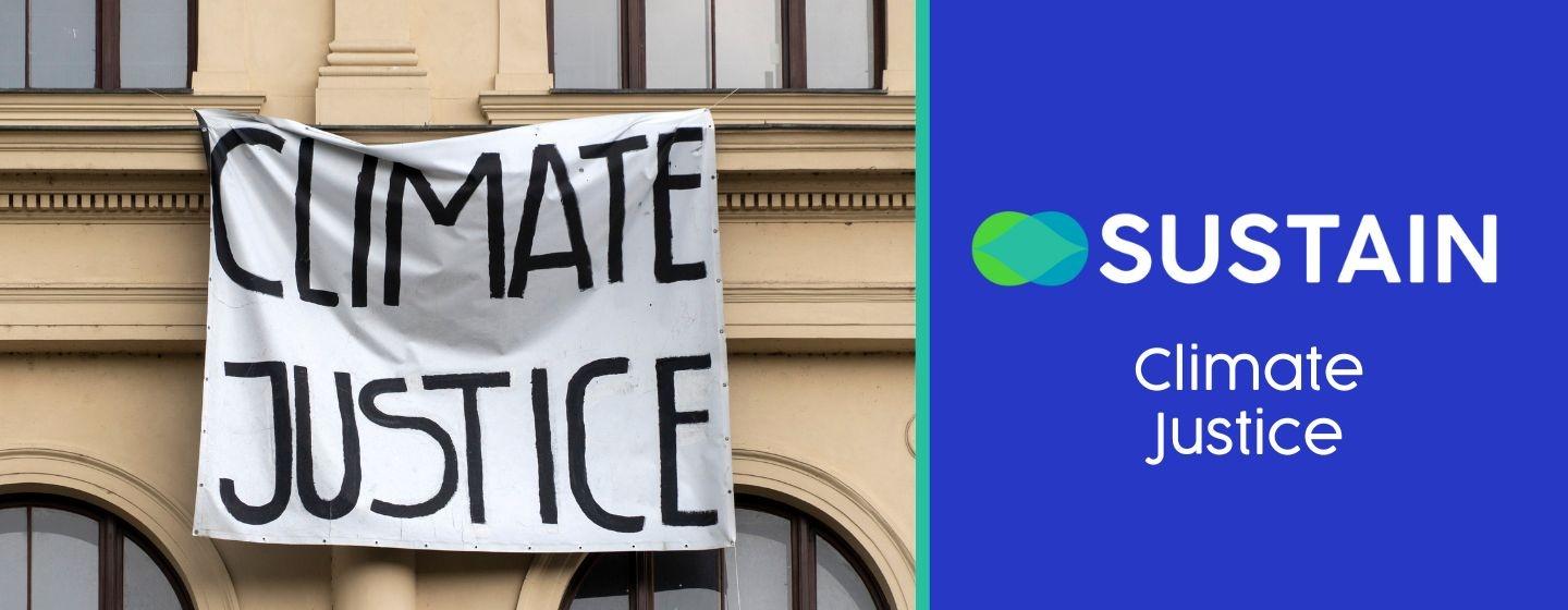 Climate Justice Banner on a Building