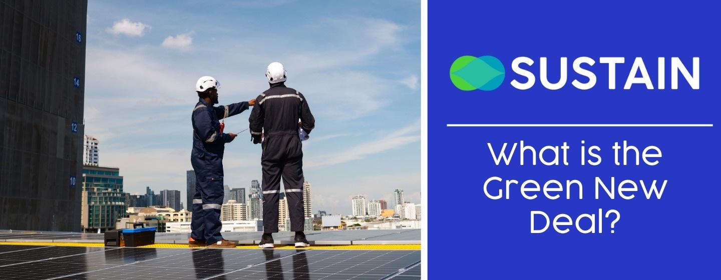 Two men standing on a roof with solar panels