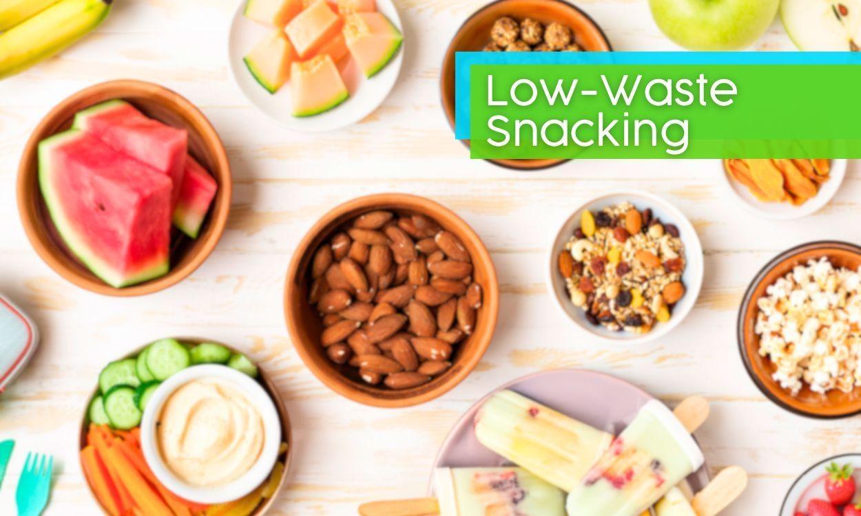 Collection of summer snack in bowls on a wooden countertop