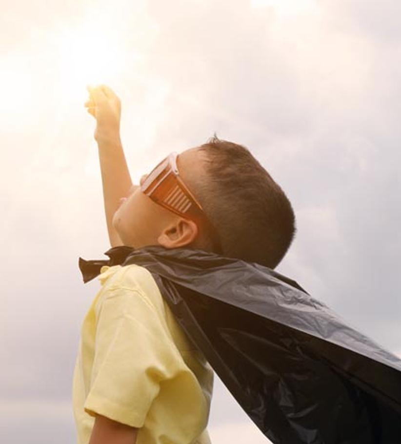 Child dressed as super hero