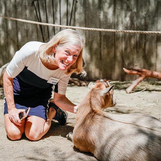 Shelley Irwin with a goat at the petting Zoo