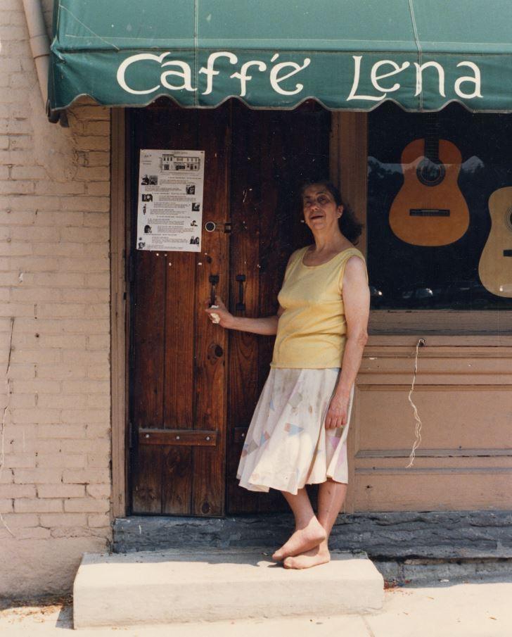 A barefoot Lena Spencer in front of Caffe Lena in the 1980s. It is now the longest running coffee house in the country.