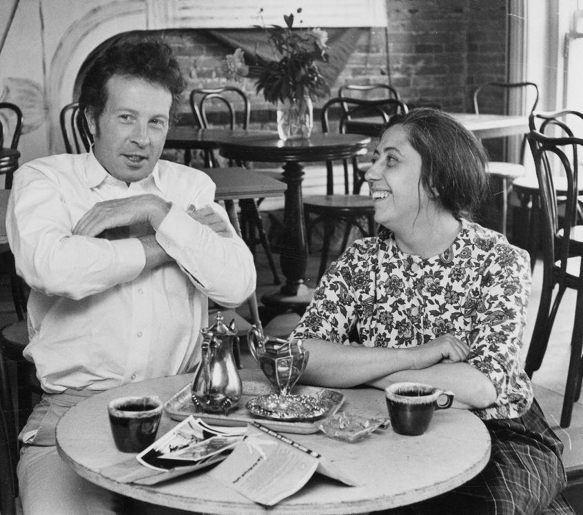 Lena sits down at the Caffe with a director of a local play. 