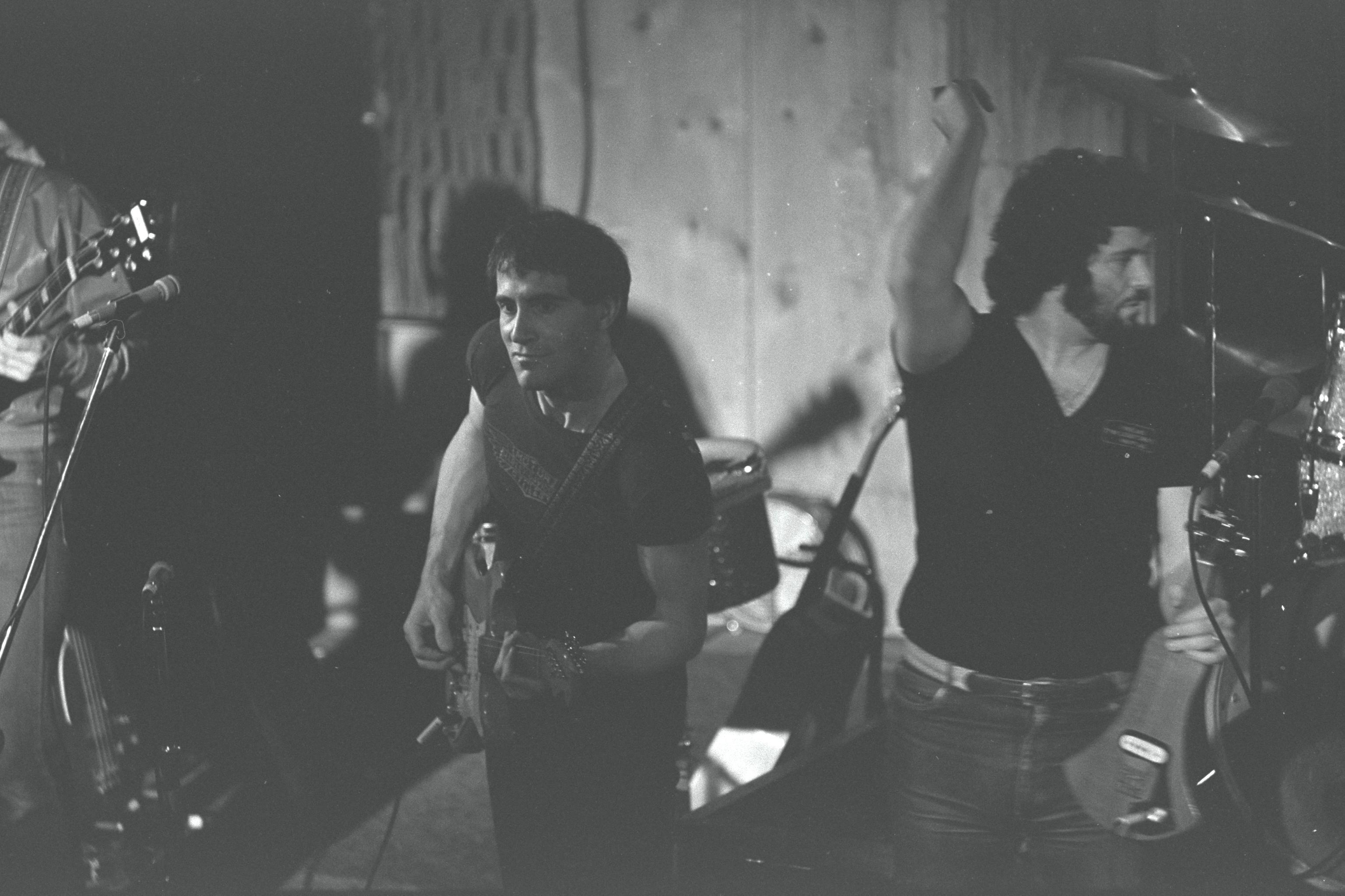 The Troggs, pictured in black and white while performing.