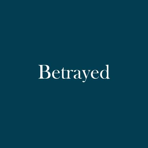 The word "betrayed" is displayed in white, serif, type on a dark green background.
