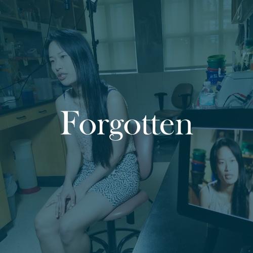 The word "Forgotten" is displayed in white, serif, type on a dark green background.