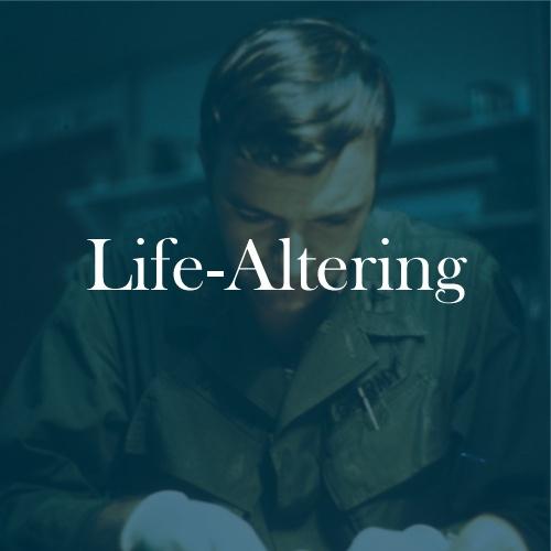 The word "Life-Altering" is displayed in white, serif, type on a dark green transparent overlay with a photo of Gus, with a military uniform on, performing a medical procedure.