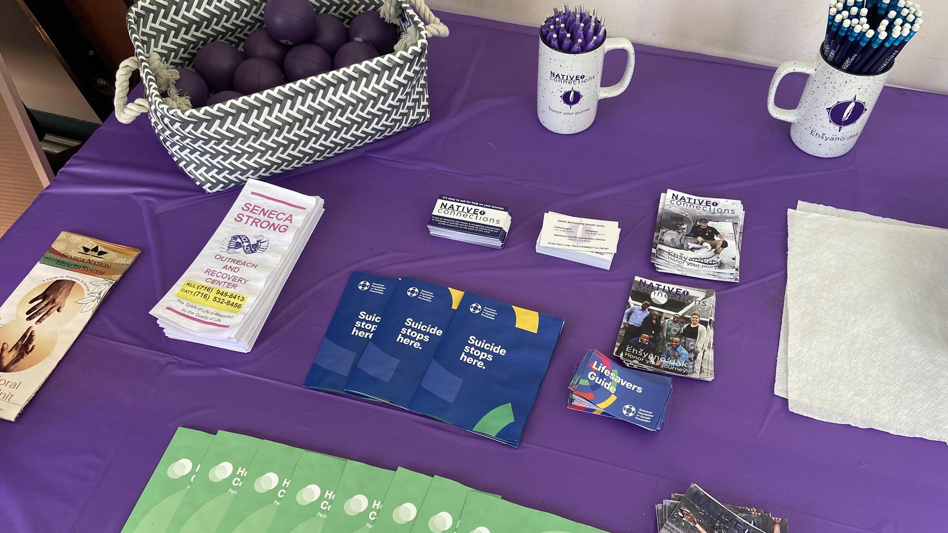 pamphlets and information about suicide prevention on a table at the Seneca Clubhouse in Cattaraugus