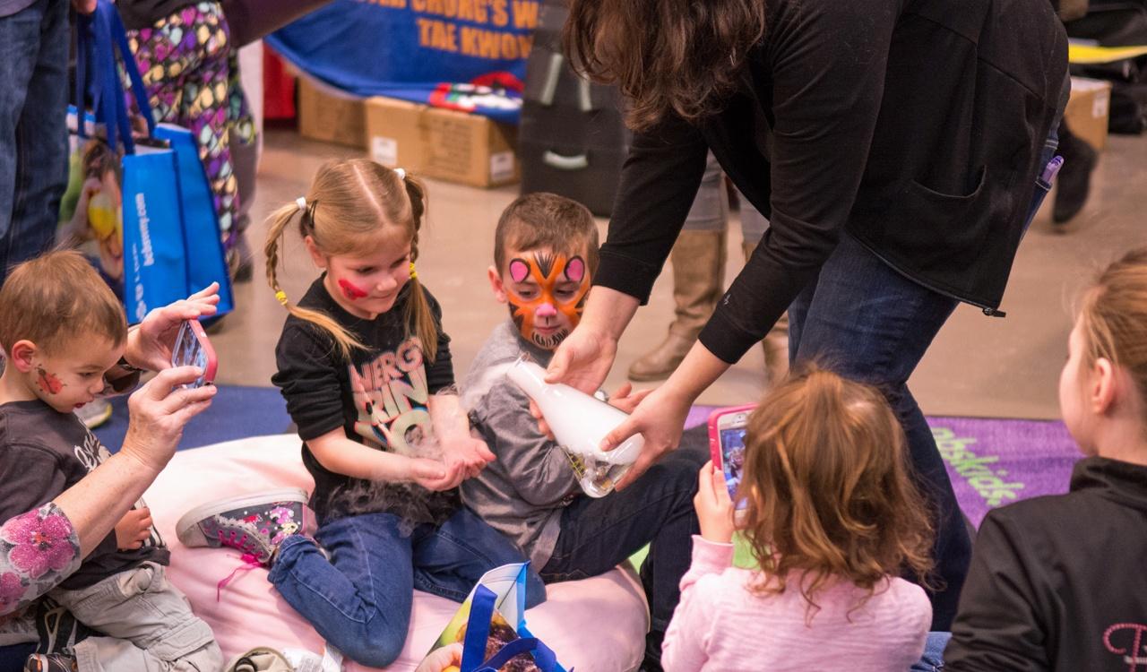 Kids learning about science with the help of the Buffalo Museum of Science