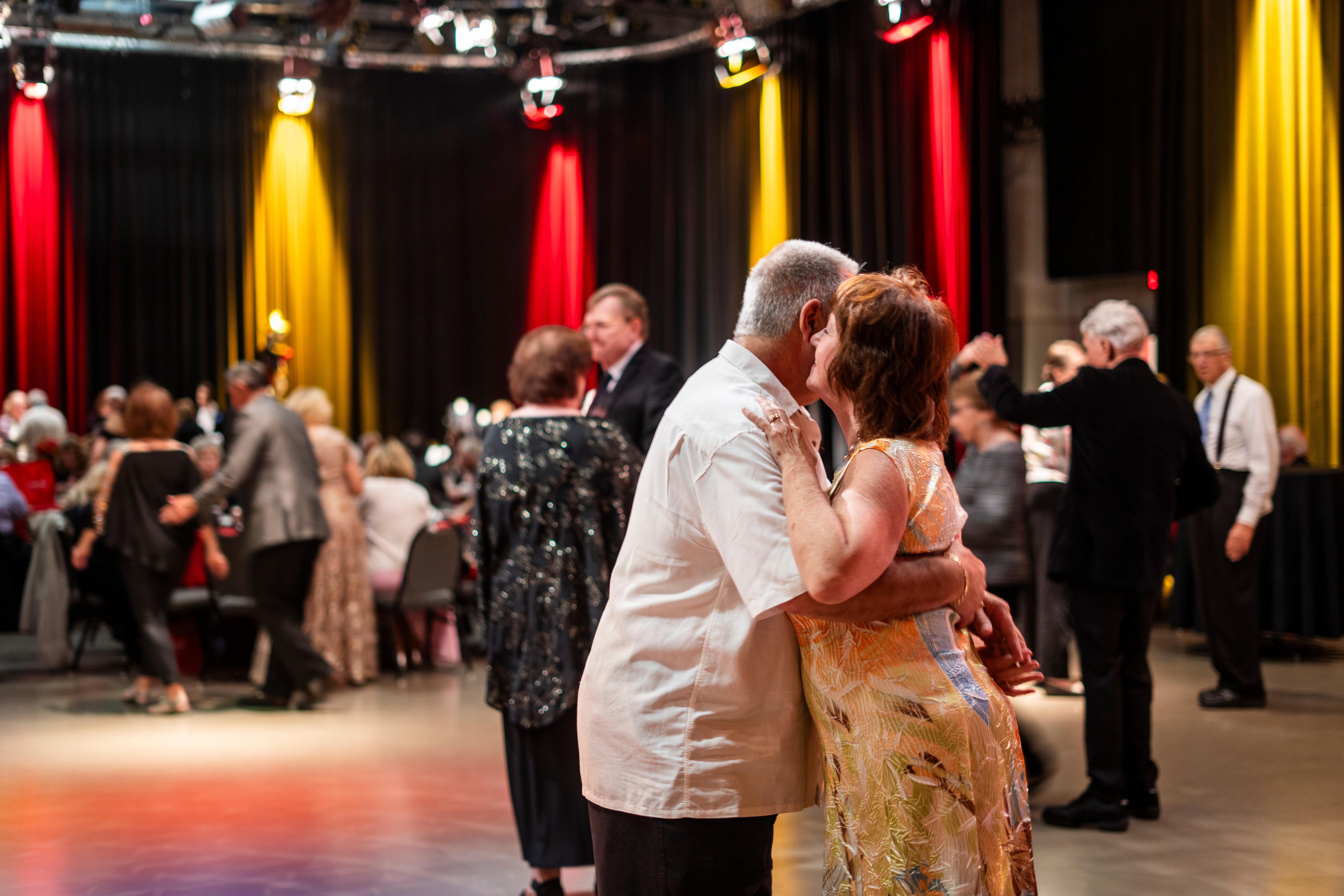 A couple dancing closely together